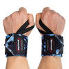 Two hands wear Rip Toned Wrist Wraps: Stiff and Flex in Blue Camo, showing black thumb loops and Velcro closures for wrist support. The Rip Toned brand is clearly visible.